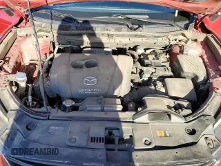2016 Mazda CX-5 Grand Touring z VIN JM3KE4DY9G0753691, wystawiony jako Copart lot #57361645 z przebiegiem 90 733 mil mil oraz Szkoda całkowita • Salvage title. Historia ofert i sprzedaży dostępna na DreamBid. Obrazek 14.