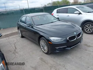 2012 BMW 3 Series 328i with VIN WBA3A5C59CF342687, listed as a IAAI auction lot 42116175 with 139,559 mi miles. Bid and sale history available at carsss.com. Image 1.