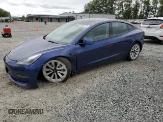 2023 Tesla Model 3 with VIN 5YJ3E1EA7PF450973, listed as a Copart auction lot 61082175 with 47,029 mi miles and Salvage title. Bid and sale history available at DreamBid. Image 1.