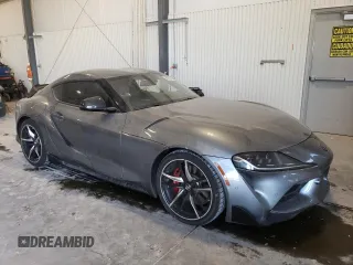 2022 Toyota GR Supra 3.0 with VIN WZ1DB0C03NW052512, listed as a Copart auction lot 86583474 with 5,774 mi miles and Salvage Title. Bid and sale history available at carsss.com. Image 4.