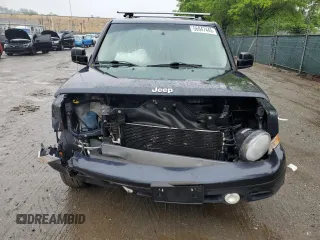 2014 Jeep Patriot Latitude with VIN 1C4NJPFA1ED651021, listed as a Copart auction lot 56947445 with 137,239 mi miles and Salvage title. Bid and sale history available at DreamBid. Image 5.