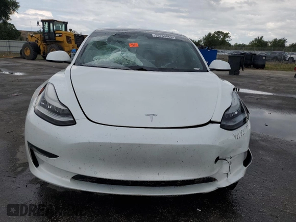 2021 Tesla Model 3 Standard Range Plus z VIN 5YJ3E1EA2MF859832, wystawiony jako Copart lot #56743865 z przebiegiem 77 025 mil mil oraz Nie do naprawy. Historia ofert i sprzedaży dostępna na DreamBid. Obrazek 5.