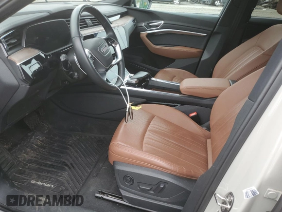 2022 Audi e-tron Premium Plus with VIN WA1LAAGE5NB009526, listed as a Copart auction lot 63073355 with 46,142 mi miles and Salvage title. Bid and sale history available at DreamBid. Image 7.