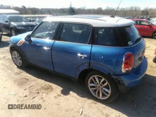 2013 MINI Cooper Countryman with VIN WMWZB3C56DWM31601, listed as a IAAI auction lot 41814031 with 139,417 mi miles. Bid and sale history available at carsss.com. Image 3.