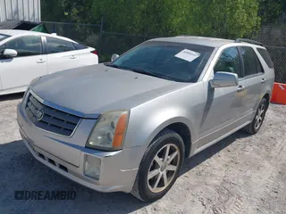 2004 Cadillac SRX with VIN 1GYEE63A840185428, listed as a IAAI auction lot 42088949 with 207,821 mi miles. Bid and sale history available at carsss.com. Image 2.