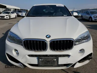 2018 BMW X6 xDrive35i with VIN 5UXKU2C52J0Z61957, listed as a Copart auction lot 73596543 with 87,119 mi miles. Bid and sale history available at carsss.com. Image 5.