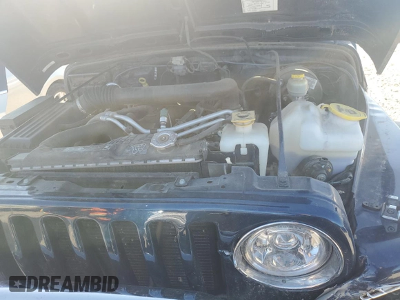 2005 Jeep Wrangler SE with VIN 1J4FA29S65P330905, listed as a Copart auction lot 71633134 with 77,598 mi miles and Salvage Title. Bid and sale history available at carsss.com. Image 11.