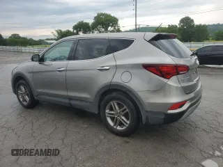2018 Hyundai Santa Fe 2.4L z VIN 5NMZTDLB7JH098559, wystawiony jako Copart lot #56868005 z przebiegiem 197 233 mil mil oraz Czysty tytuł • Clean title. Historia ofert i sprzedaży dostępna na DreamBid. Obrazek 2.