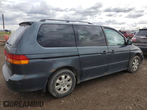 2003 Honda Odyssey EX with VIN 2HKRL18603H008412, listed as a Copart auction lot 55310905 with 352,774 mi miles and Salvage Title. Bid and sale history available at DreamBid. Image 3.