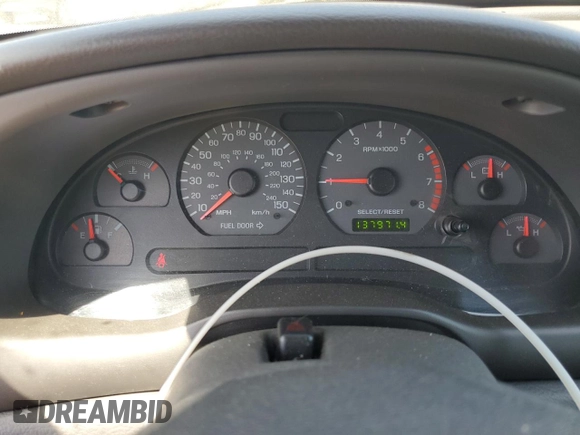 2002 Ford Mustang GT Deluxe z VIN 1FAFP45X22F101551, wystawiony jako Copart lot #55184645 z przebiegiem 137 971 mil mil oraz Szkoda całkowita • Salvage title. Historia ofert i sprzedaży dostępna na DreamBid. Obrazek 9.