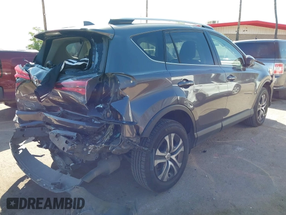2016 Toyota RAV4 LE with VIN JTMBFREV4GJ052168, listed as a IAAI auction lot 41837564 with 73,659 mi miles. Bid and sale history available at carsss.com. Image 6.