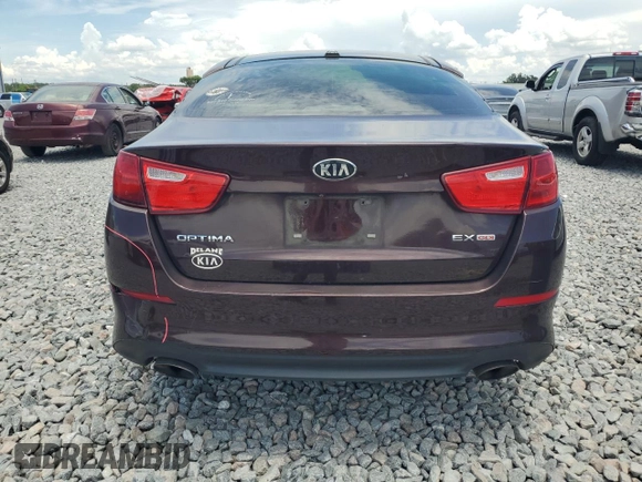 2015 Kia Optima EX with VIN 5XXGN4A71FG409750, listed as a Copart auction lot 64105865 with 313,992 mi miles and Salvage title. Bid and sale history available at DreamBid. Image 6.