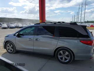 2020 Honda Odyssey EX-L with VIN 5FNRL6H72LB055672, listed as a IAAI auction lot 41586663 with 47,037 mi miles and . Bid and sale history available at carsss.com. Image 14.