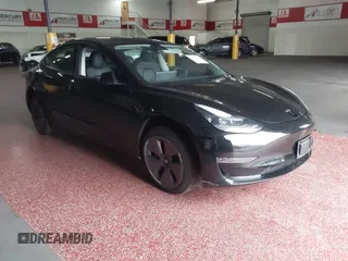 2023 Tesla Model 3 with VIN 5YJ3E1EA0PF499349, listed as a IAAI auction lot 41775999 with 44,178 mi miles and . Bid and sale history available at DreamBid. Image 1.
