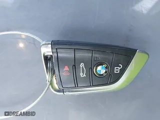 2017 BMW X1 xDrive28i with VIN WBXHT3C30H5F68187, listed as a IAAI auction lot 41830892 with 101,313 mi miles. Bid and sale history available at carsss.com. Image 11.