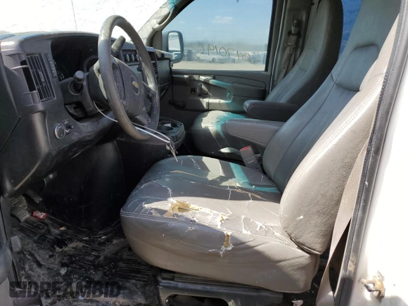 2012 Chevrolet Express Cargo Van with VIN 1GCWGFCA8C1100293, listed as a Copart auction lot 50470195 with 250,615 mi miles and Salvage Title. Bid and sale history available at carsss.com. Image 7.
