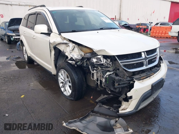 2014 Dodge Journey SXT with VIN 3C4PDCBGXET182430, listed as a IAAI auction lot 41599489 with 143,889 mi miles. Bid and sale history available at carsss.com. Image 6.