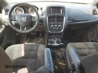 2015 Dodge Grand Caravan American Value with VIN 2C4RDGBG7FR703916, listed as a Copart auction lot 54830915 with 197,539 mi miles and Clean Title. Bid and sale history available at DreamBid. Image 8.