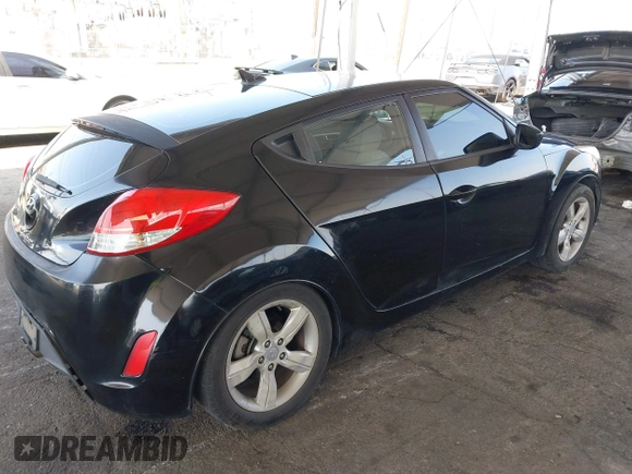 2013 Hyundai Veloster w/Black Int with VIN KMHTC6AD6DU088815, listed as a IAAI auction lot 42184776 with 204,930 mi miles and . Bid and sale history available at DreamBid. Image 4.