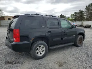 2009 GMC Yukon SLT 4SB z VIN 1GKFK33009R298337, wystawiony jako Copart lot #57701715 z przebiegiem 185 652 mil mil oraz Tytuł czysty. Historia ofert i sprzedaży dostępna na DreamBid. Obrazek 3.