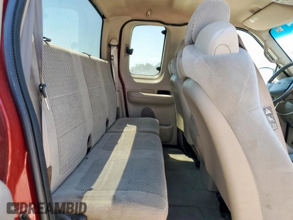 2002 Ford F-150 XL with VIN 1FTRX17202NA40522, listed as a Copart auction lot 58208915 with 100,297 mi miles and Salvage title. Bid and sale history available at DreamBid. Image 10.