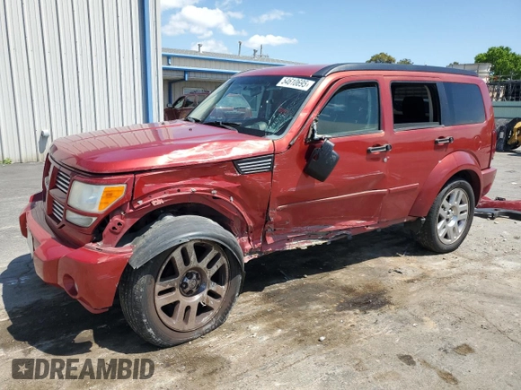 2010 Dodge Nitro Heat with VIN 1D4PT4GKXAW156990, listed as a Copart auction lot 54610695 with 180,620 mi miles and Salvage title. Bid and sale history available at DreamBid. Image 1.