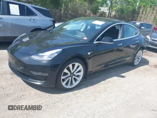 2018 Tesla Model 3 Long Range Battery z VIN 5YJ3E1EB9JF086703, wystawiony jako IAAI lot #42290193 z przebiegiem 46 255 mil mil oraz . Historia ofert i sprzedaży dostępna na DreamBid. Obrazek 21.