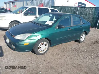 2001 Ford Focus SE with VIN 1FAFP34301W153462, listed as a IAAI auction lot 42000065 with 121,946 mi miles and . Bid and sale history available at carsss.com. Image 2.