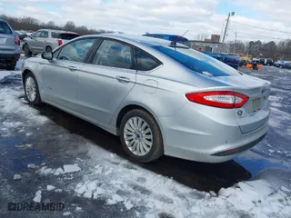 2014 Ford Fusion SE Hybrid with VIN 3FA6P0LU6ER334941, listed as a IAAI auction lot 41444793 with 144,332 mi miles. Bid and sale history available at carsss.com. Image 3.
