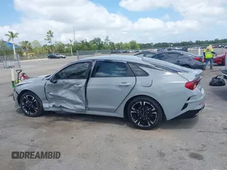 2023 Kia K5 GT-Line z VIN 5XXG64J25PG179696, wystawiony jako IAAI lot #42114587 z przebiegiem 49 192 mil mil oraz . Historia ofert i sprzedaży dostępna na DreamBid. Obrazek 14.