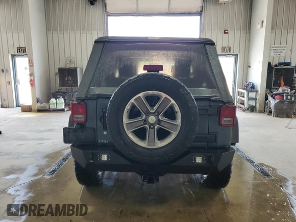 2007 Jeep Wrangler Unlimited Sahara с VIN 1J8GA591X7L217299, выставлен на аукционе Copart как лот 61984395 с пробегом 151 171 миль миль и Списание • Salvage title. История ставок и продаж доступна на DreamBid. Изображение 6.