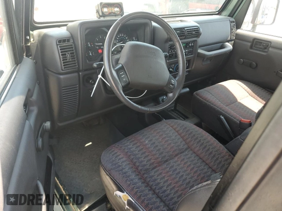 2000 Jeep Wrangler Sport с VIN 1J4FA49S4YP710633, выставлен на аукционе Copart как лот 65095875 с пробегом 107 613 миль миль и Чистый • Clean title. История ставок и продаж доступна на DreamBid. Изображение 8.