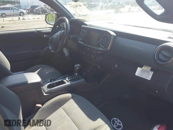 2017 Toyota Tacoma SR5 z VIN 3TMCZ5AN7HM065835, wystawiony jako IAAI lot #40250247 z przebiegiem 221 022 mil mil oraz . Historia ofert i sprzedaży dostępna na DreamBid. Obrazek 5.