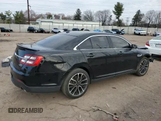 2018 Ford Taurus SEL with VIN 1FAHP2E8XJG137910, listed as a Copart auction lot 50883605 with 104,425 mi miles and Salvage Title. Bid and sale history available at carsss.com. Image 3.