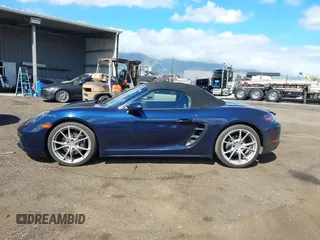 2018 Porsche 718 Boxster z VIN WP0CA2A8XJS210766, wystawiony jako IAAI lot #41617239 z przebiegiem 55 336 mil mil oraz . Historia ofert i sprzedaży dostępna na DreamBid. Obrazek 14.