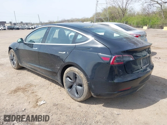 2018 Tesla Model 3 Long Range Battery z VIN 5YJ3E1EB2JF103096, wystawiony jako IAAI lot #42016324 z przebiegiem 143 247 mil mil oraz . Historia ofert i sprzedaży dostępna na DreamBid. Obrazek 3.