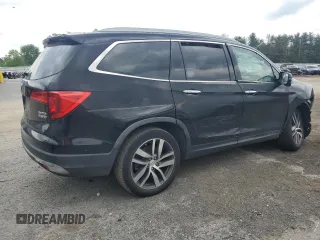 2017 Honda Pilot Touring with VIN 5FNYF6H90HB024321, listed as a Copart auction lot 57459895 with 134,244 mi miles and Salvage title. Bid and sale history available at DreamBid. Image 3.