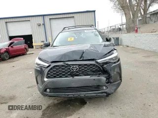 2024 Toyota Corolla Cross XLE with VIN 7MUDAABG2RV107422, listed as a Copart auction lot 47667095 with 8,579 mi miles and Salvage title. Bid and sale history available at DreamBid. Image 11.