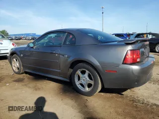 2004 Ford Mustang Standard z VIN 1FAFP40654F138305, wystawiony jako Copart lot #65882195 z przebiegiem 89 404 mil mil oraz Czysty tytuł • Clean title. Historia ofert i sprzedaży dostępna na DreamBid. Obrazek 2.