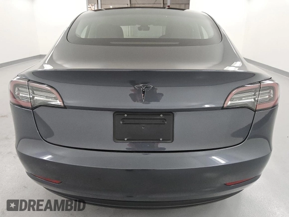 2023 Tesla Model 3 z VIN 5YJ3E1EA3PF459640, wystawiony jako Copart lot #61107195 z przebiegiem 141 027 mil mil oraz Czysty tytuł • Clean title. Historia ofert i sprzedaży dostępna na DreamBid. Obrazek 6.