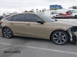 2025 Honda Civic Sport Touring z VIN 19XFL4H98SE001953, wystawiony jako IAAI lot #42024904 z przebiegiem 4 868 mil mil oraz . Historia ofert i sprzedaży dostępna na DreamBid. Obrazek 14.