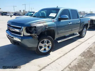2010 Chevrolet Silverado 1500 LT with VIN 3GCRKSE33AG251396, listed as a IAAI auction lot 41773362 with 176,979 mi miles. Bid and sale history available at carsss.com. Image 2.