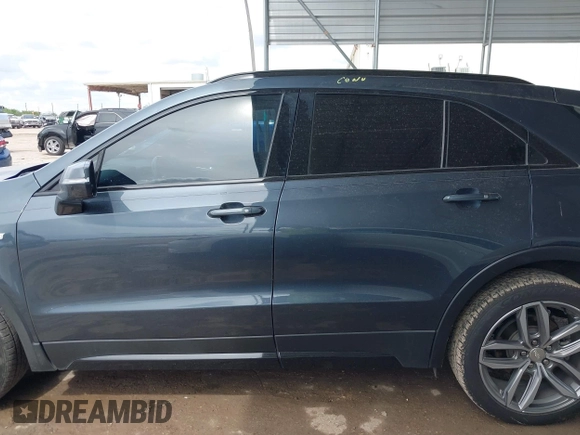 2019 Cadillac XT4 FWD Sport z VIN 1GYFZER49KF215843, wystawiony jako IAAI lot #41912861 z przebiegiem 102 922 mil mil oraz . Historia ofert i sprzedaży dostępna na DreamBid. Obrazek 14.