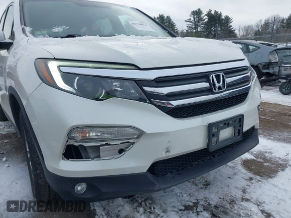 2017 Honda Pilot EX-L with VIN 5FNYF6H52HB015651, listed as a IAAI auction lot 41538814 with 121,433 mi miles and . Bid and sale history available at DreamBid. Image 17.
