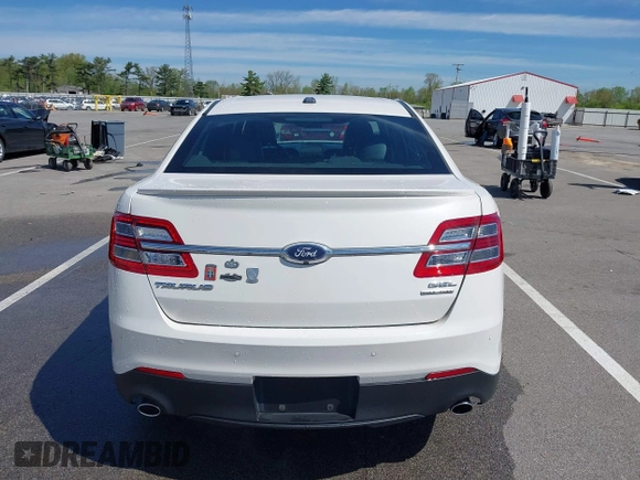 2016 Ford Taurus SEL with VIN 1FAHP2E88GG131659, listed as a IAAI auction lot 42205065 with 99,416 mi miles and . Bid and sale history available at DreamBid. Image 16.