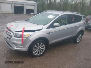 2017 Ford Escape Titanium with VIN 1FMCU0J96HUC21987, listed as a IAAI auction lot 41971376 with 97,488 mi miles and . Bid and sale history available at DreamBid. Image 17.