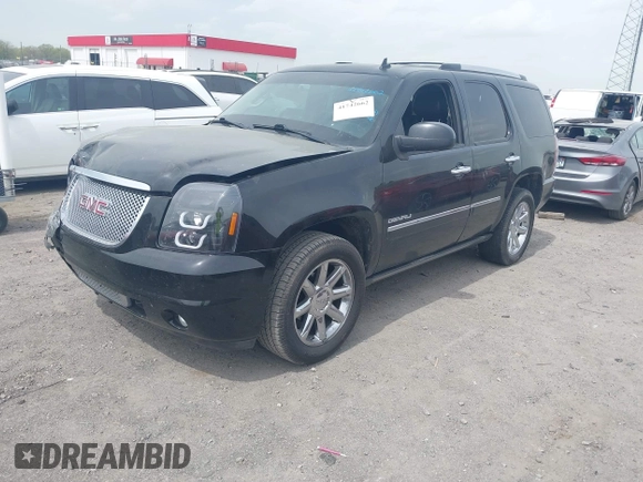 2014 GMC Yukon Denali z VIN 1GKS1EEFXER113493, wystawiony jako IAAI lot #41742662 z przebiegiem 150 382 mil mil oraz . Historia ofert i sprzedaży dostępna na DreamBid. Obrazek 2.