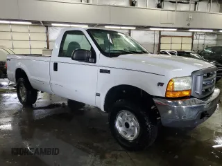 2001 Ford Super Duty F-250 XL with VIN 1FTNF21L21ED24936, listed as a Copart auction lot 79459704 with 69,304 mi miles and Clean Title. Bid and sale history available at carsss.com. Image 4.