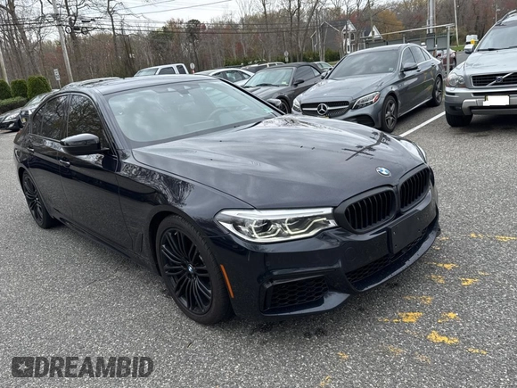 2018 BMW 5 Series M550i xDrive with VIN WBAJB9C57JB035521, listed as a Copart auction lot 54177125 with 63,924 mi miles and Clean Title. Bid and sale history available at carsss.com. Image 1.