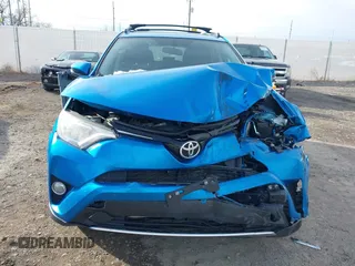 2016 Toyota RAV4 XLE with VIN JTMRFREV4GD186580, listed as a IAAI auction lot 40916703 with 117,120 mi miles and . Bid and sale history available at DreamBid. Image 6.